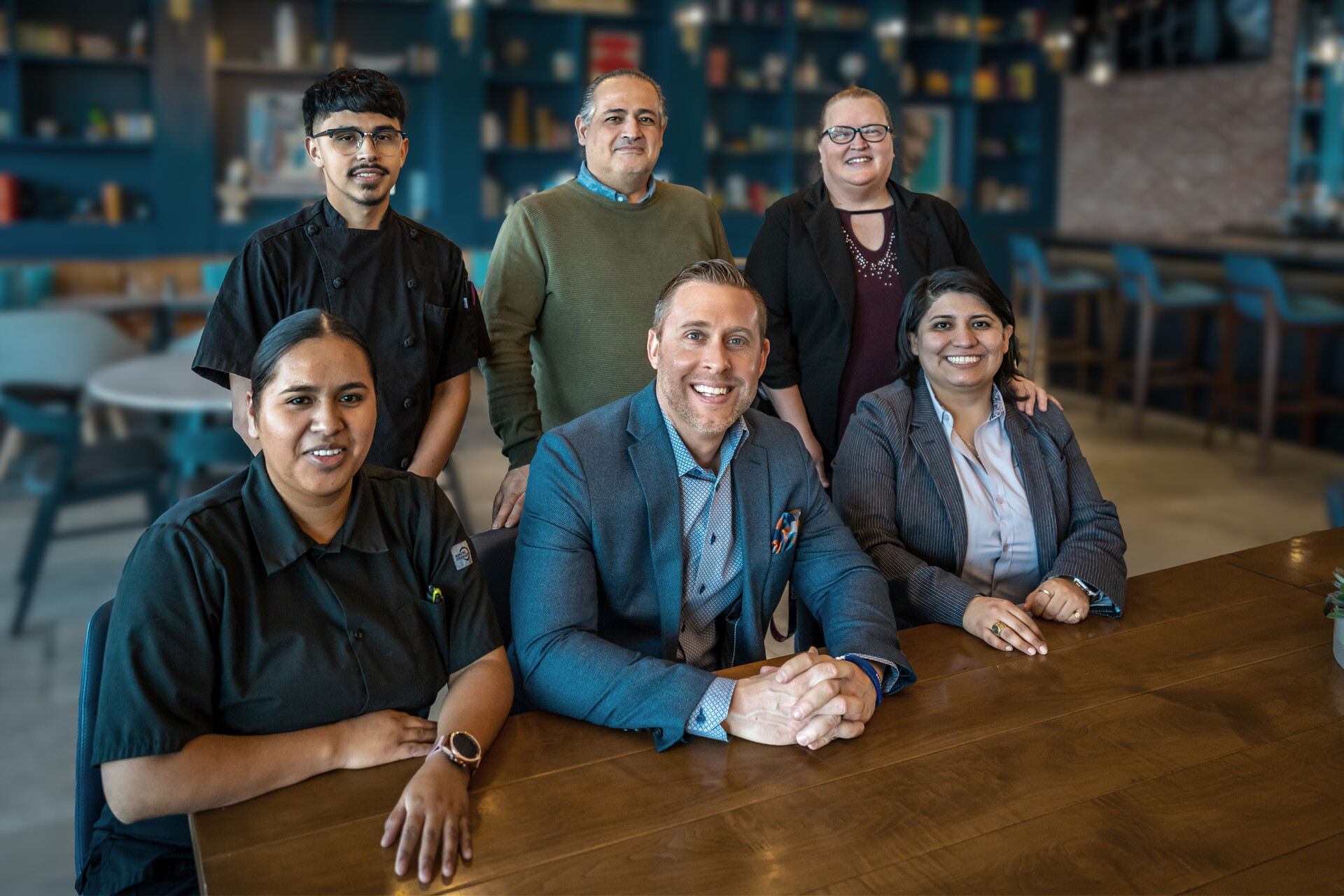 a group of people posing for a photo