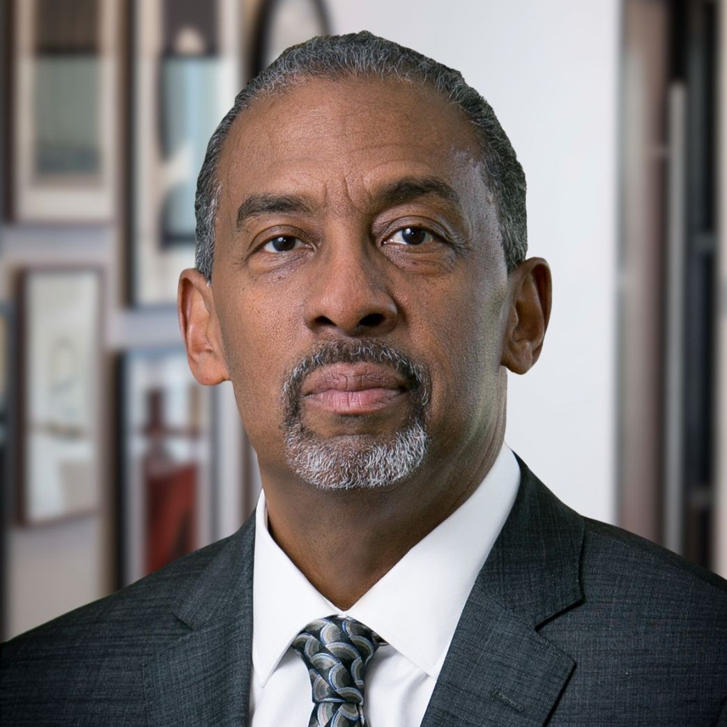 Man in dark suit and tie