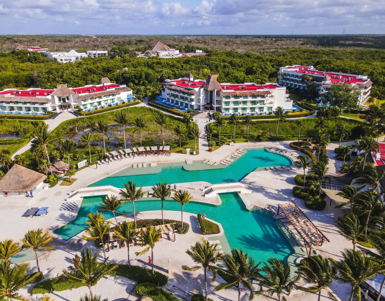 Aerial view of hotel and pool with two separate pools